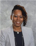 Photo of Dr. Judd-Manning, an African American woman in a gray blazer.